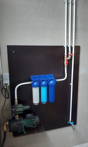 Plaatsing regenwatervoorziening garage JH Workx sanitair